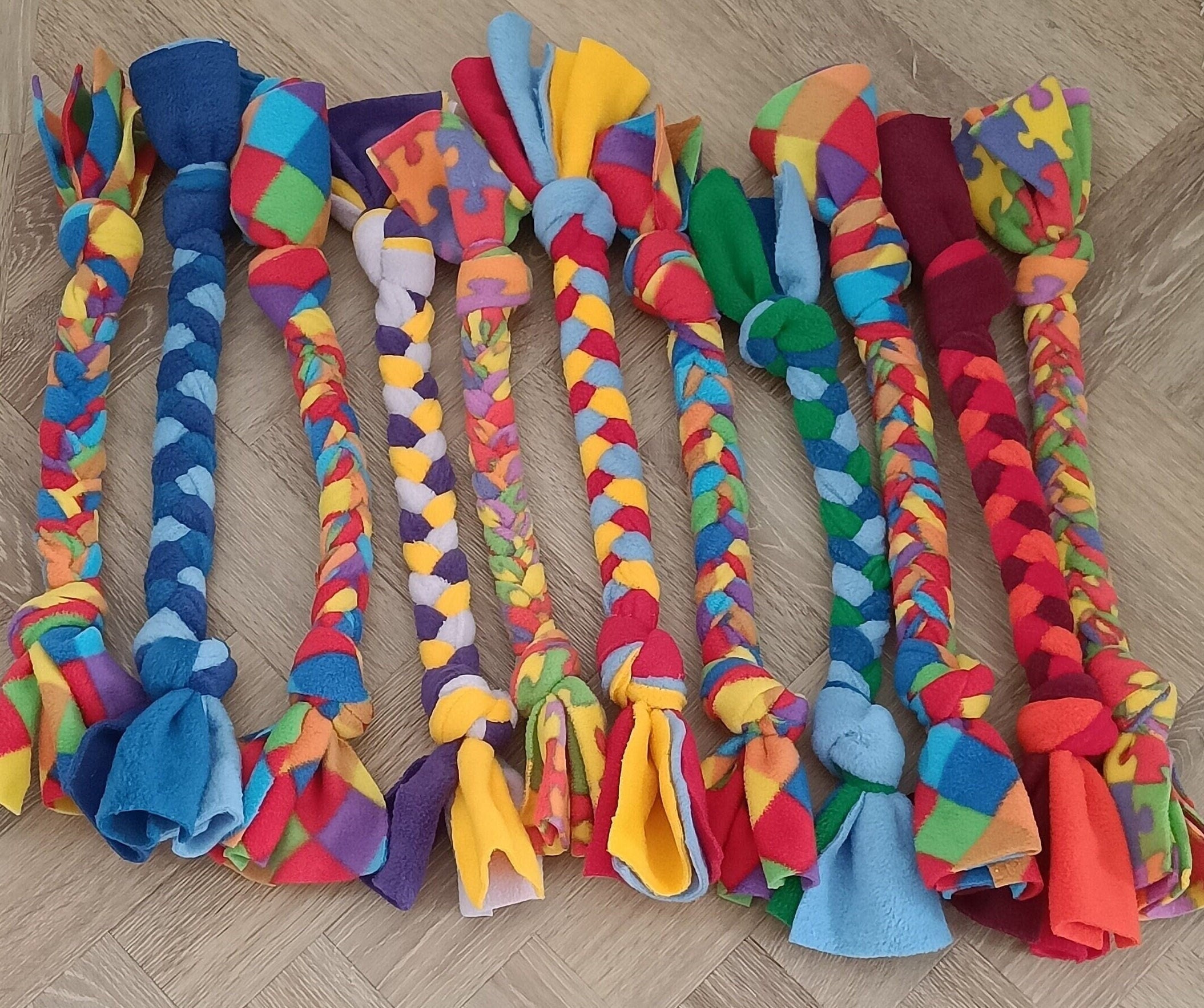 Fleece plaited Dog tug Multicolored Puppy Chew training toy, throw and fetch game