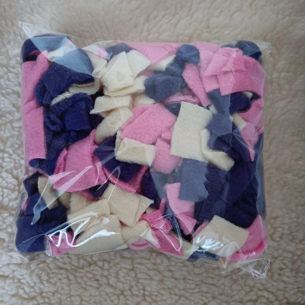 Snuffle mat for small pet, treat dispenser, foraging, sniffing, finding snacks, dog toy