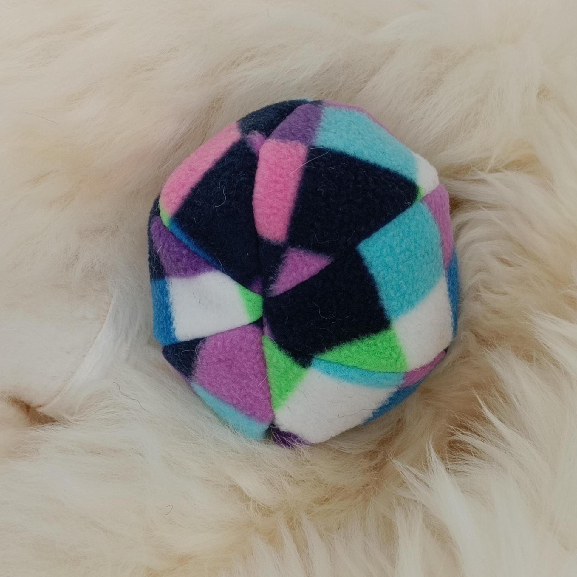 Fleece soft ball dog toy filled with sheepskin - squeaker option available