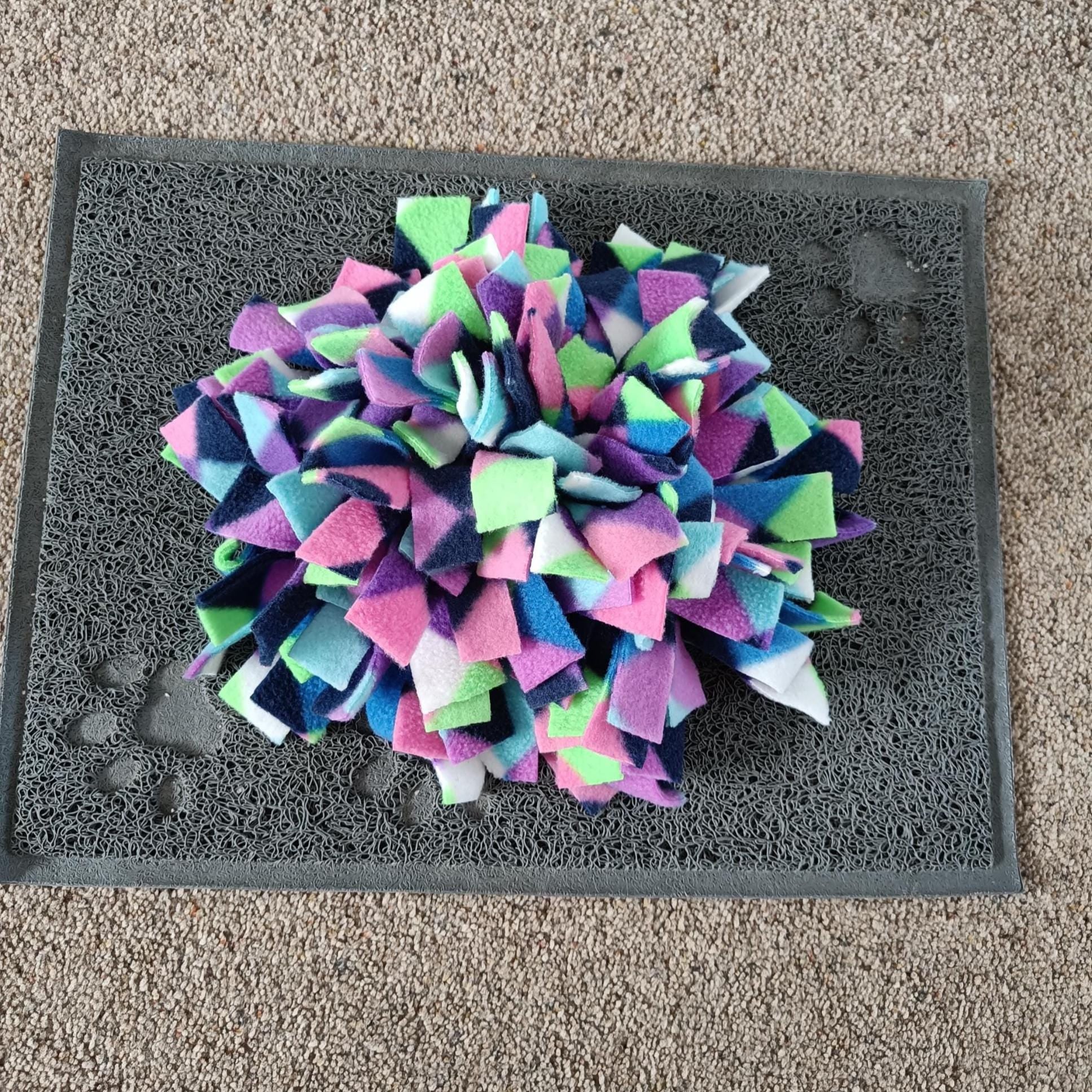 Snuffle mat for small pet, treat dispenser, foraging, sniffing, finding snacks, dog toy