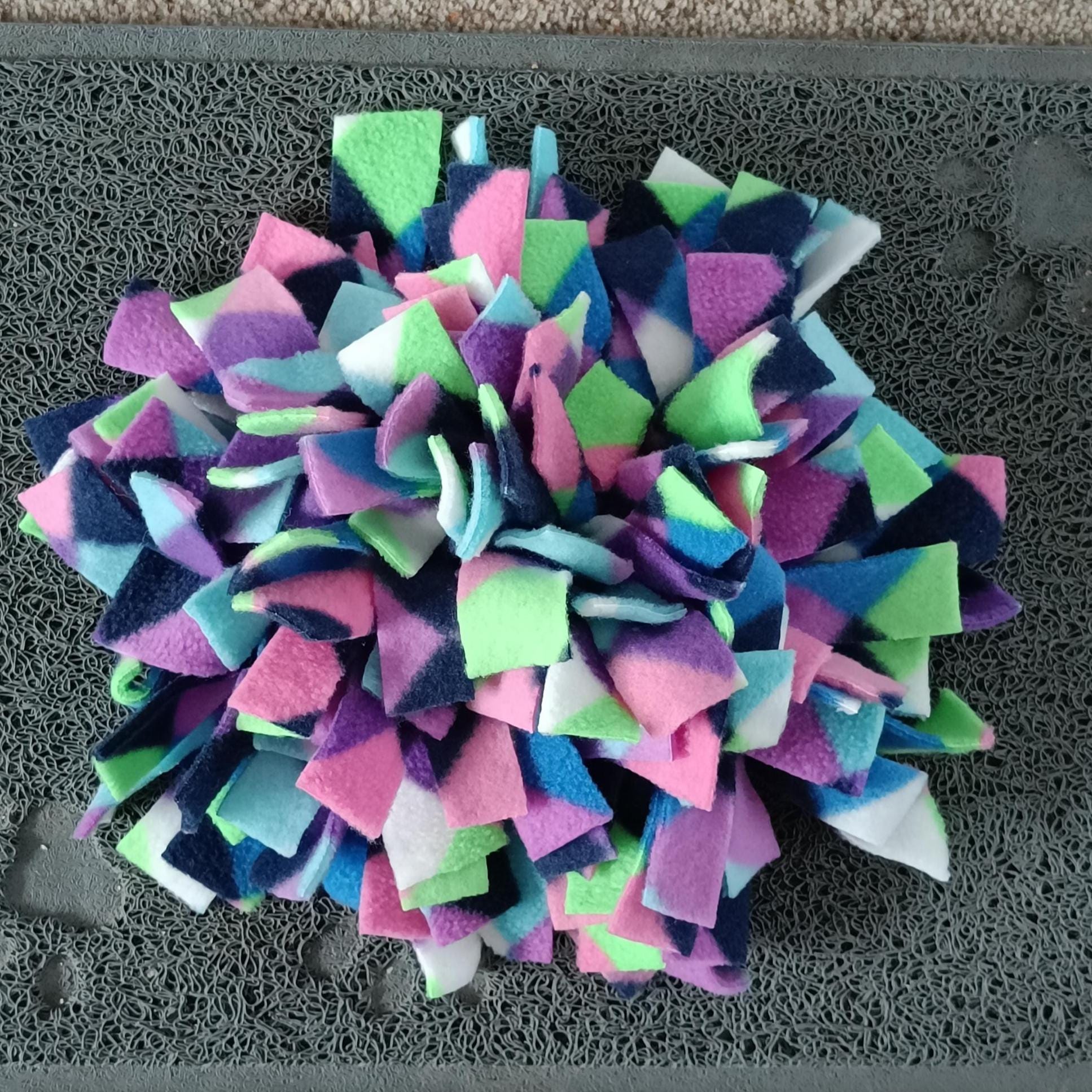 Snuffle mat for small pet, treat dispenser, foraging, sniffing, finding snacks, dog toy