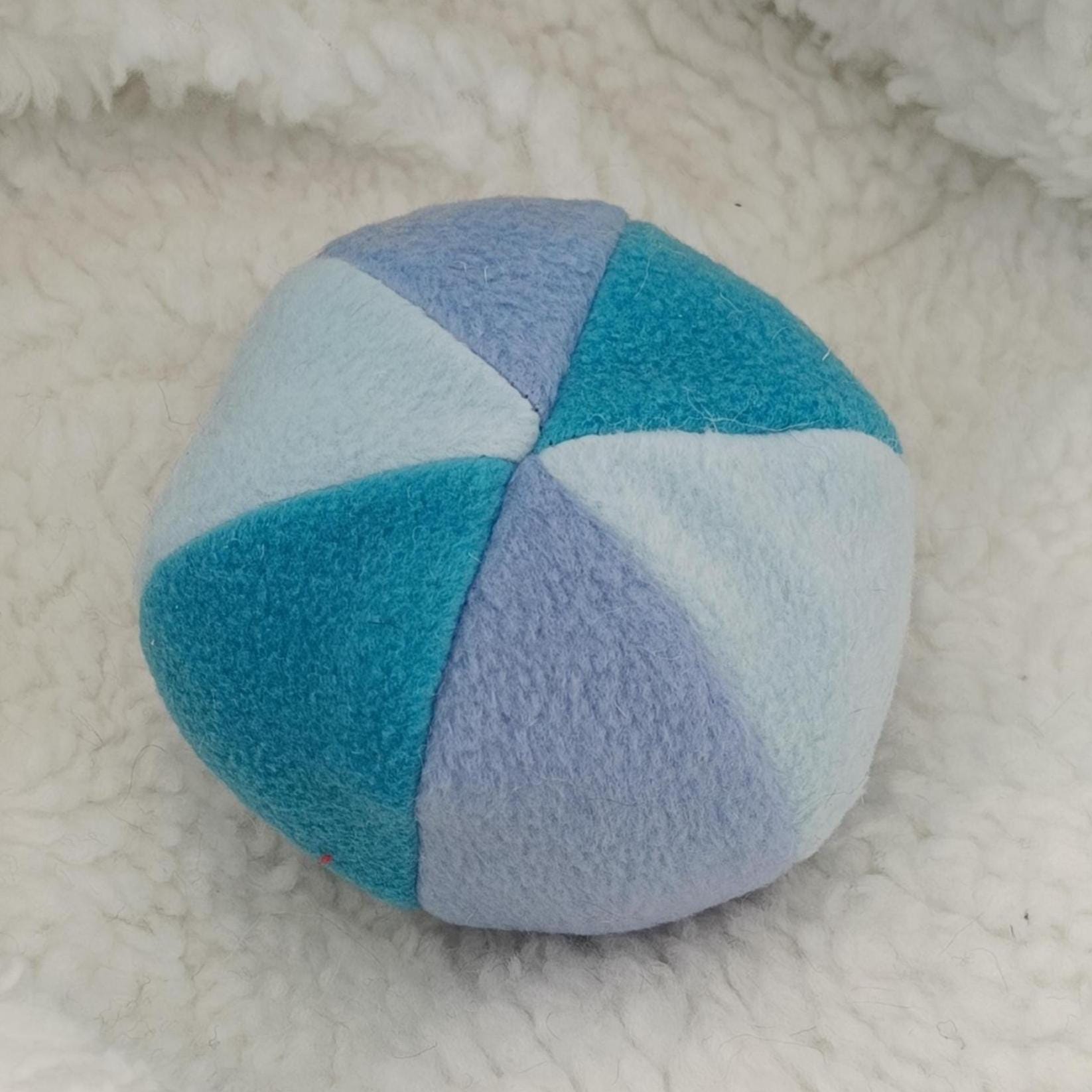 Fleece soft ball dog toy filled with sheepskin - squeaker option available