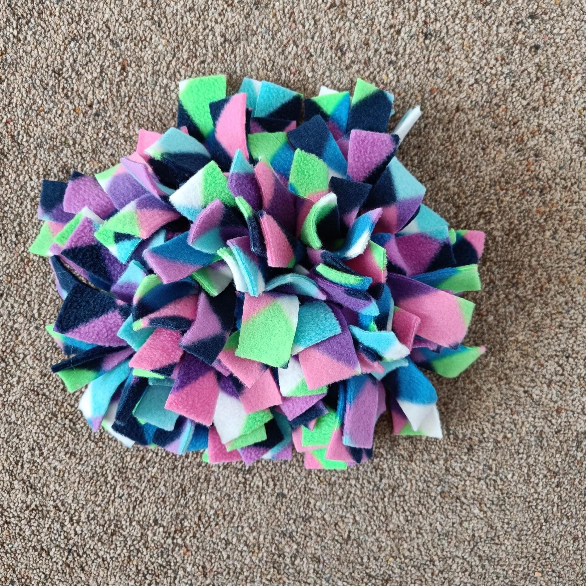 Snuffle mat for small pet, treat dispenser, foraging, sniffing, finding snacks, dog toy