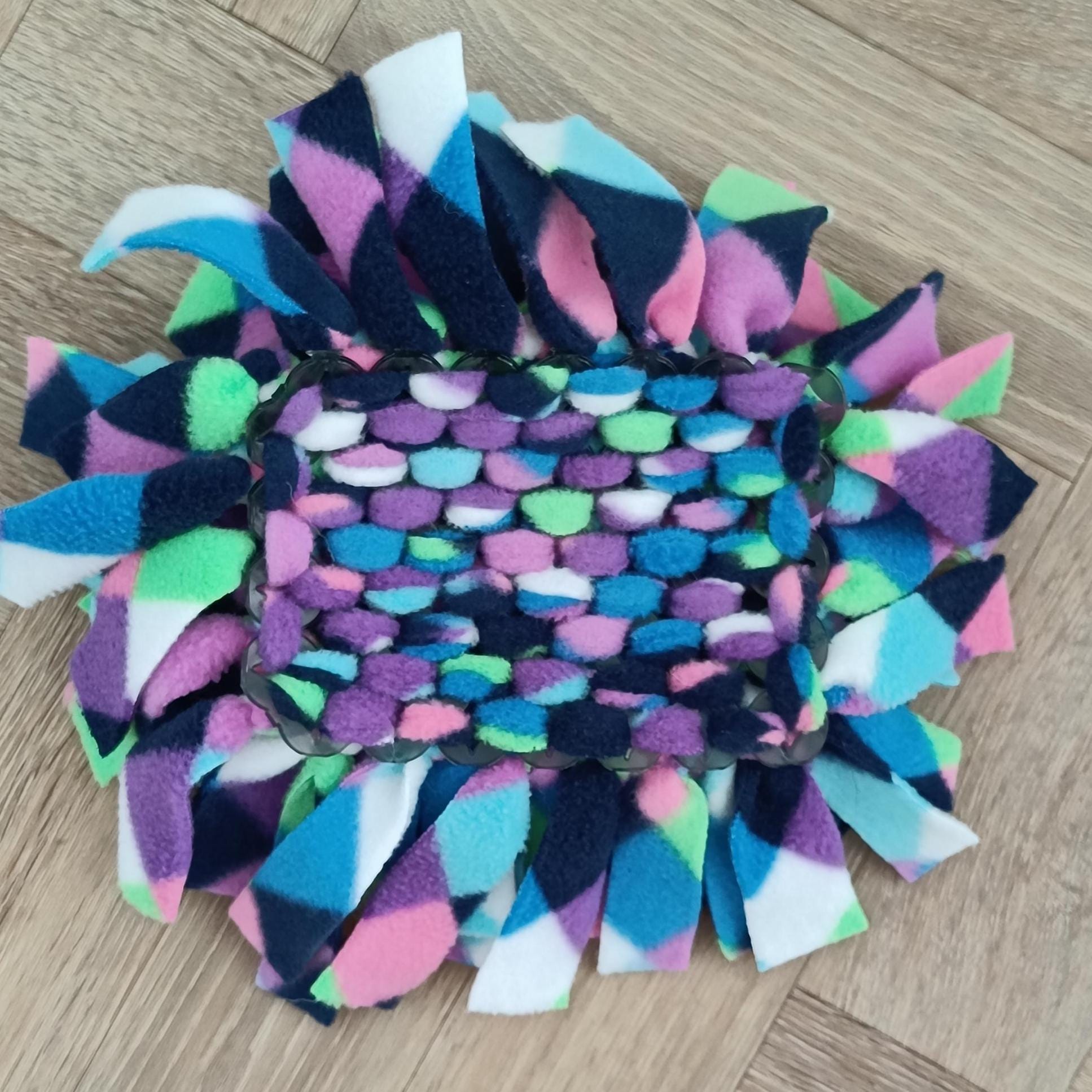 Snuffle mat for small pet, treat dispenser, foraging, sniffing, finding snacks, dog toy