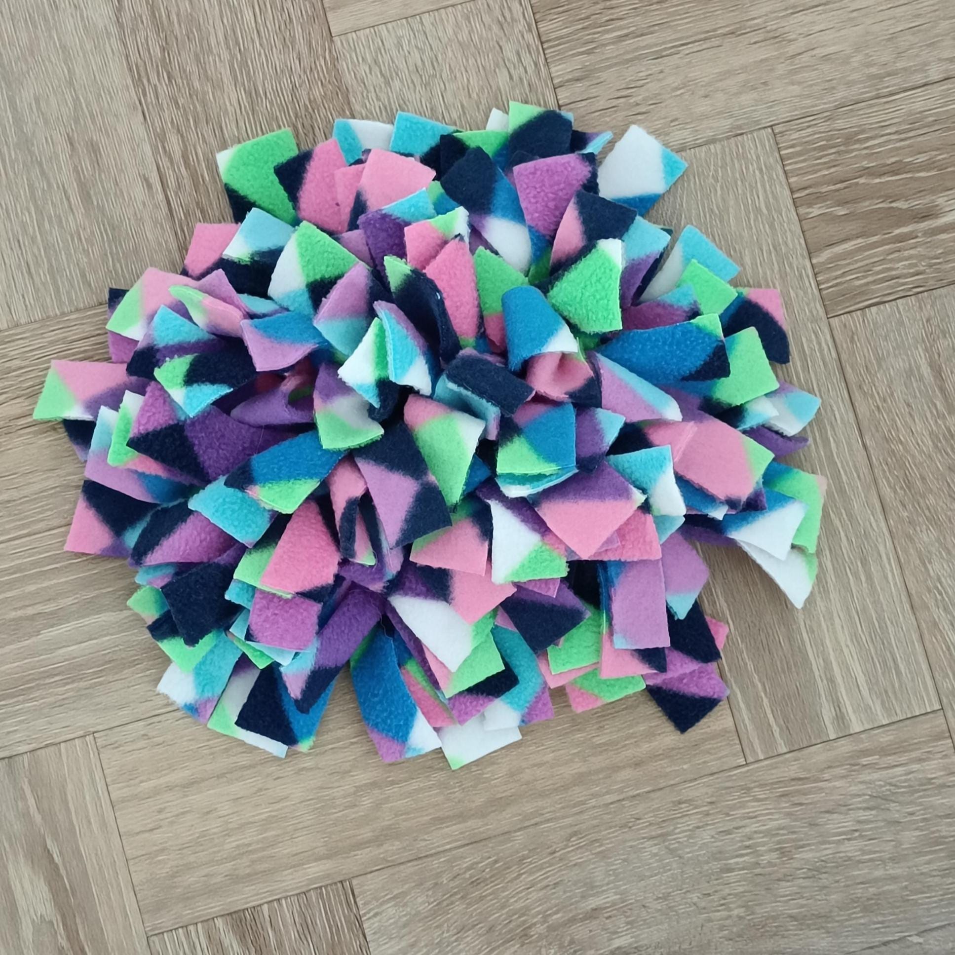 Snuffle mat for small pet, treat dispenser, foraging, sniffing, finding snacks, dog toy