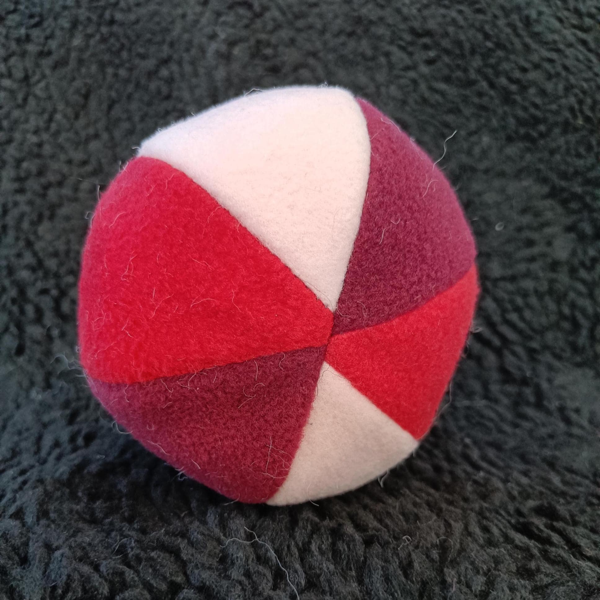 Fleece soft ball dog toy filled with sheepskin - squeaker option available