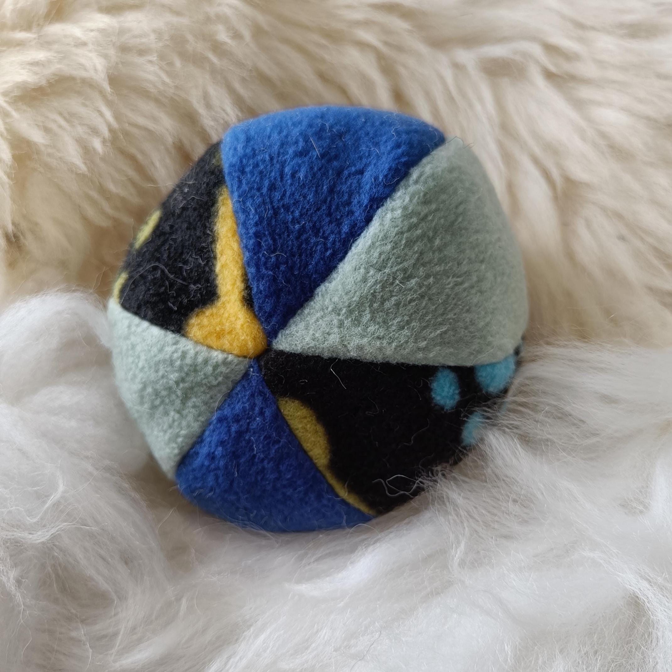 Fleece soft ball dog toy filled with sheepskin - squeaker option available