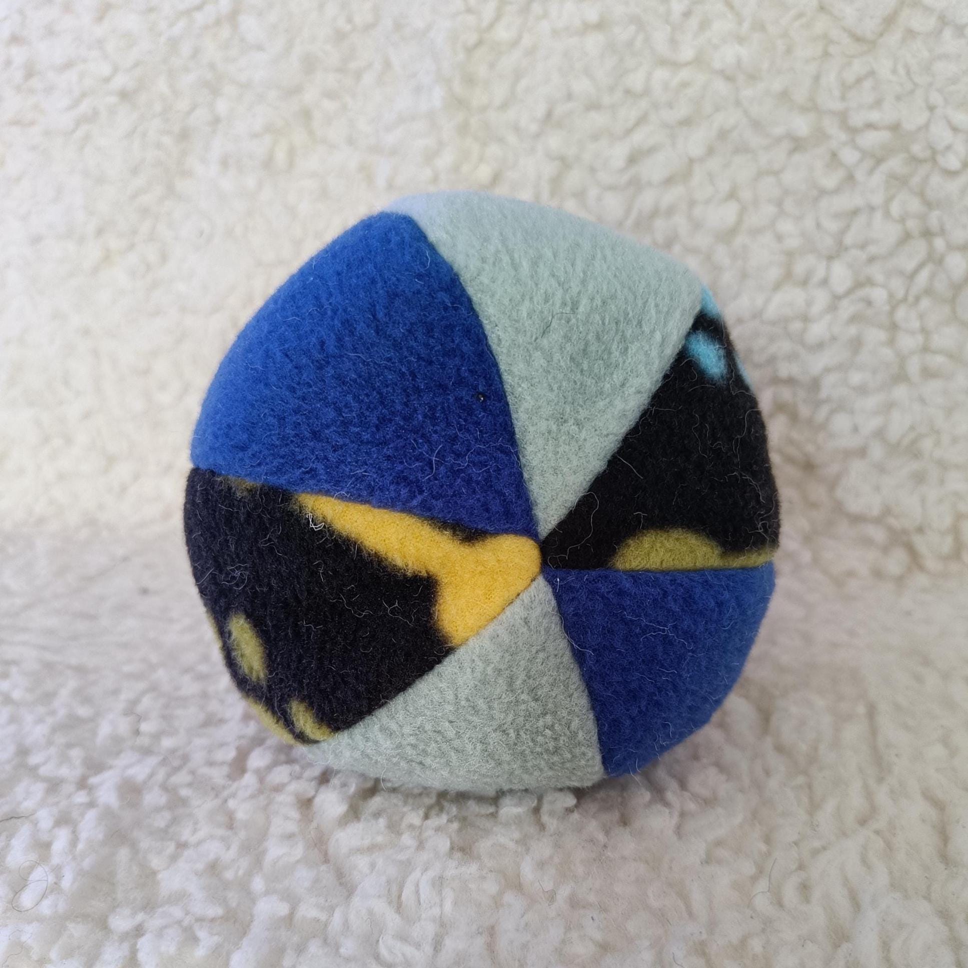 Fleece soft ball dog toy filled with sheepskin - squeaker option available